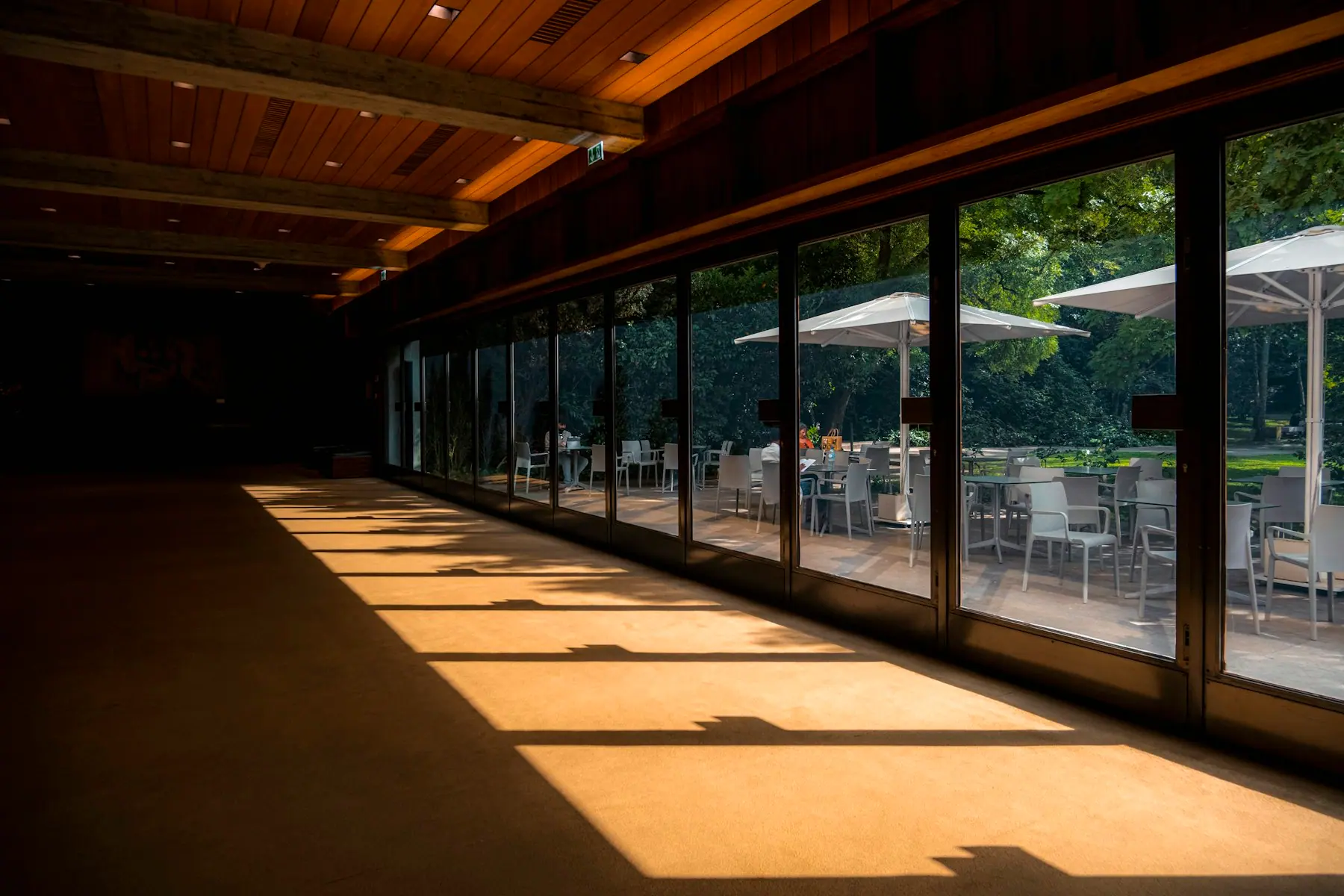 An open-sided wooden yoga pavilion